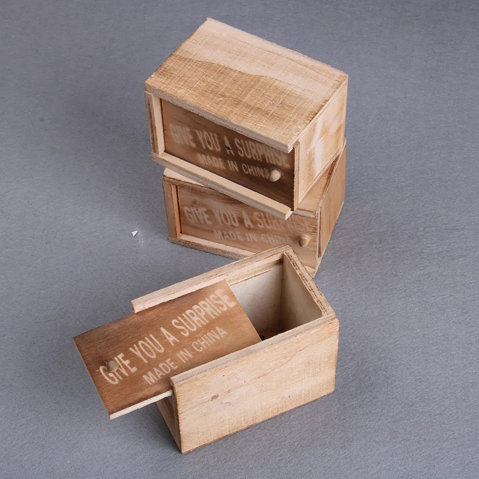 Wooden scare box prank toy with jumping animal surprise for April Fools gags