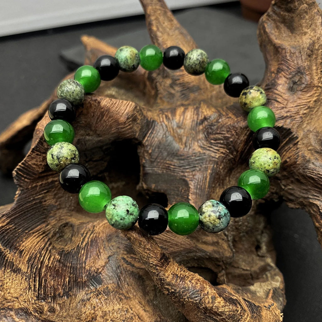 Men's casual green onyx obsidian crystal bracelet with 8mm handmade artificial crystal beads on a wrist