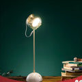 Contemporary desk lamp with a glass lampshade, dimmable LED light, and touch switch control.