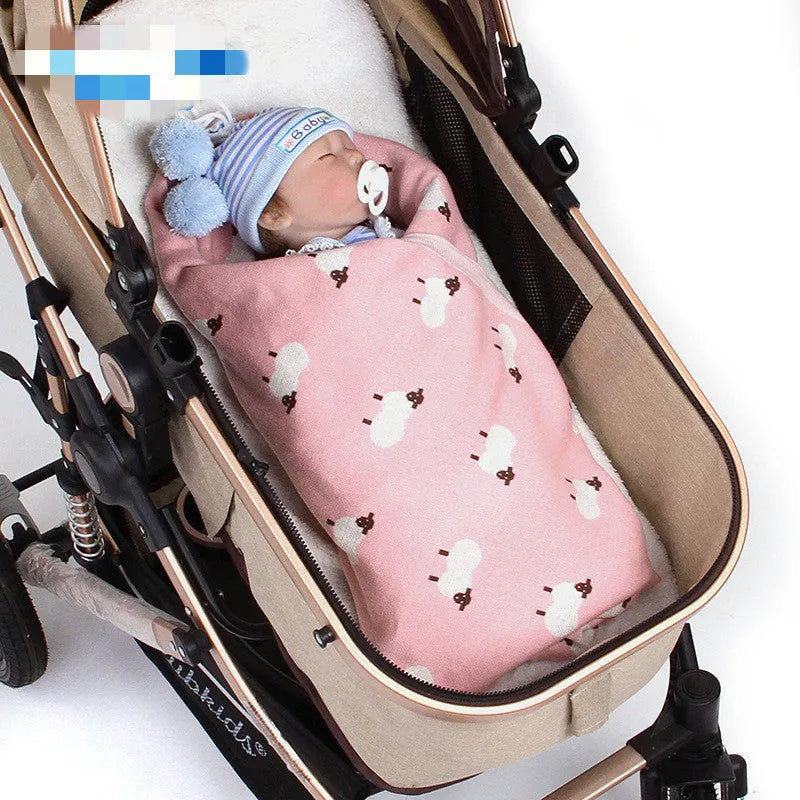 Pink and grey 100% cotton baby sheepskin blanket measuring 100x80cm for cots and prams.