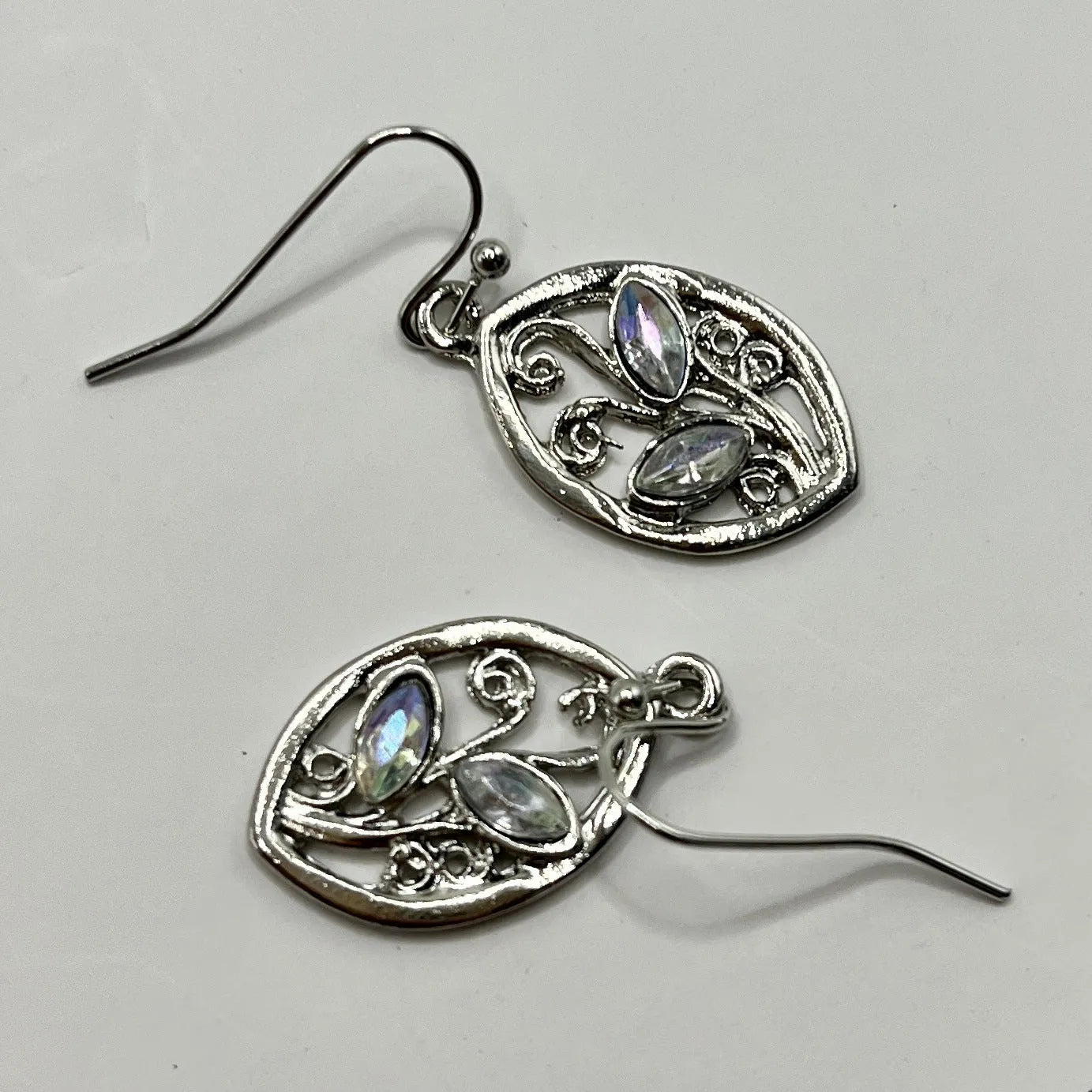 Silver leaf-shaped earrings with embedded colourful moonstones for women