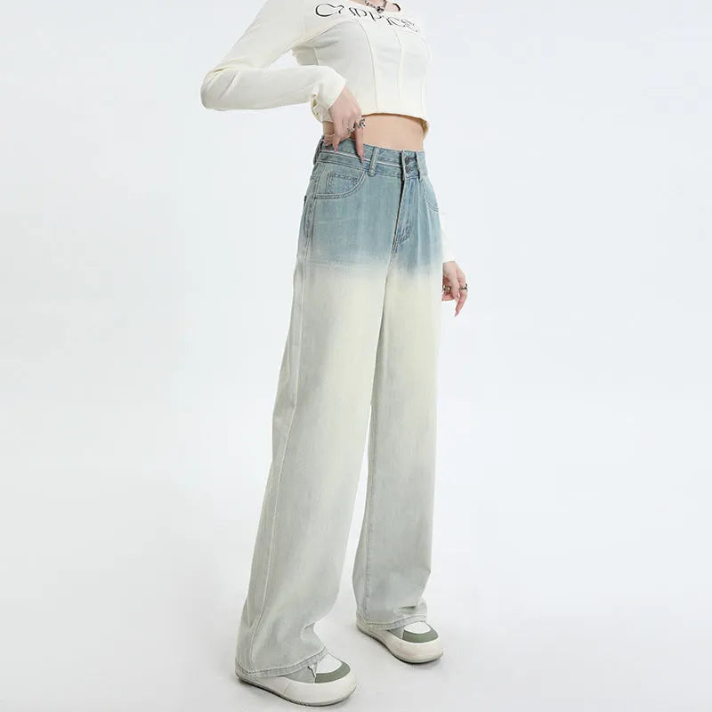 Women's gradient blue wide-leg straight-leg denim trousers on a hanger.