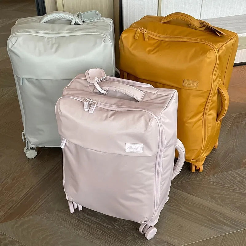 Ultra-light waterproof Oxford cloth suitcase in bluestone green colour with universal wheels