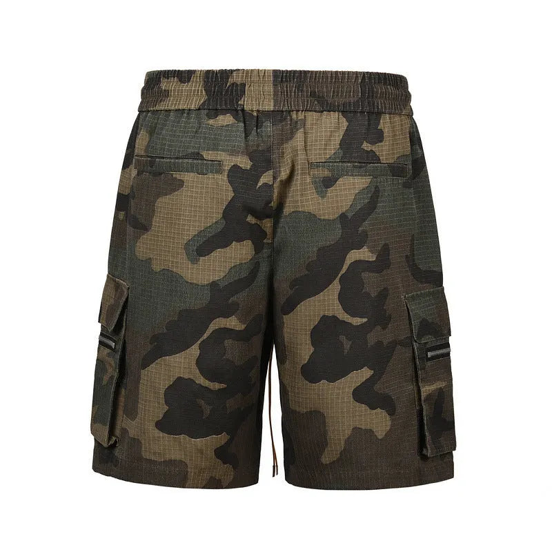 Green H215 washed camouflage workwear shorts with multiple bag pockets, loose fit.