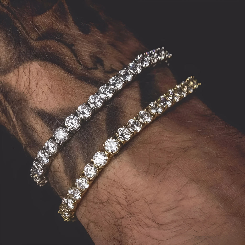 Men's silver geometric bracelet with a row of clear rhinestones and a gold tennis charm on a chain link.