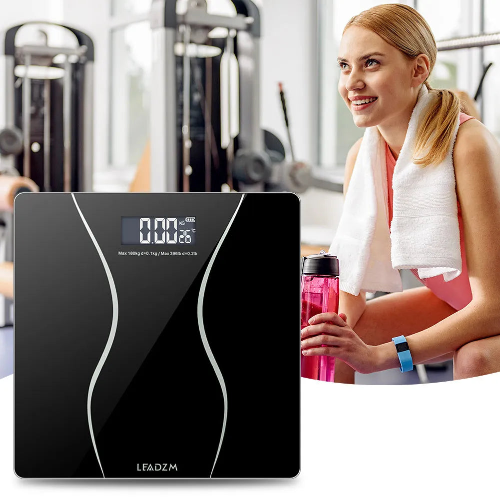 Matte black electronic body scale with digital display for weight measurement up to 180kg
