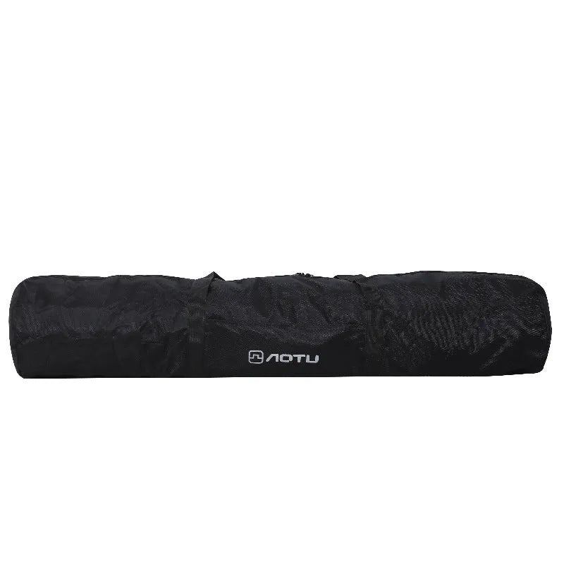 Green waterproof camping storage bag shown expanded and compressed, holding a folding chair and tent.
