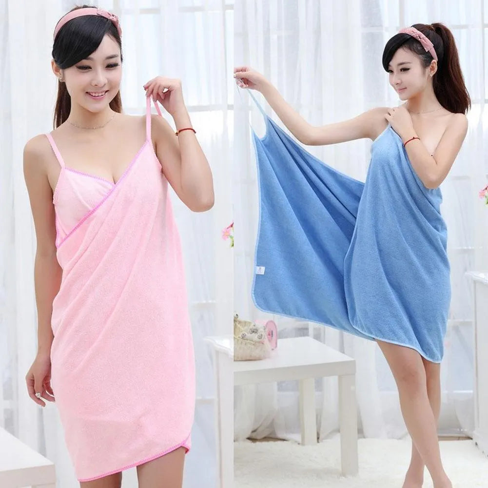 Lightweight microfiber beach towel dress shown in blue, worn as a cover-up at the beach.