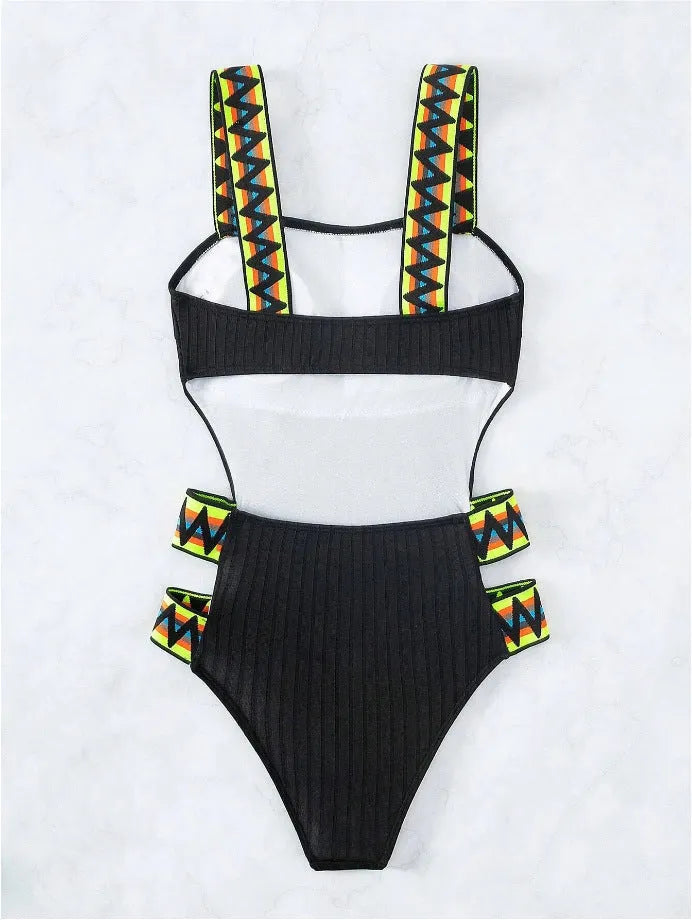 Women's solid colour one-piece swimsuit in black or orange, made from polyester.