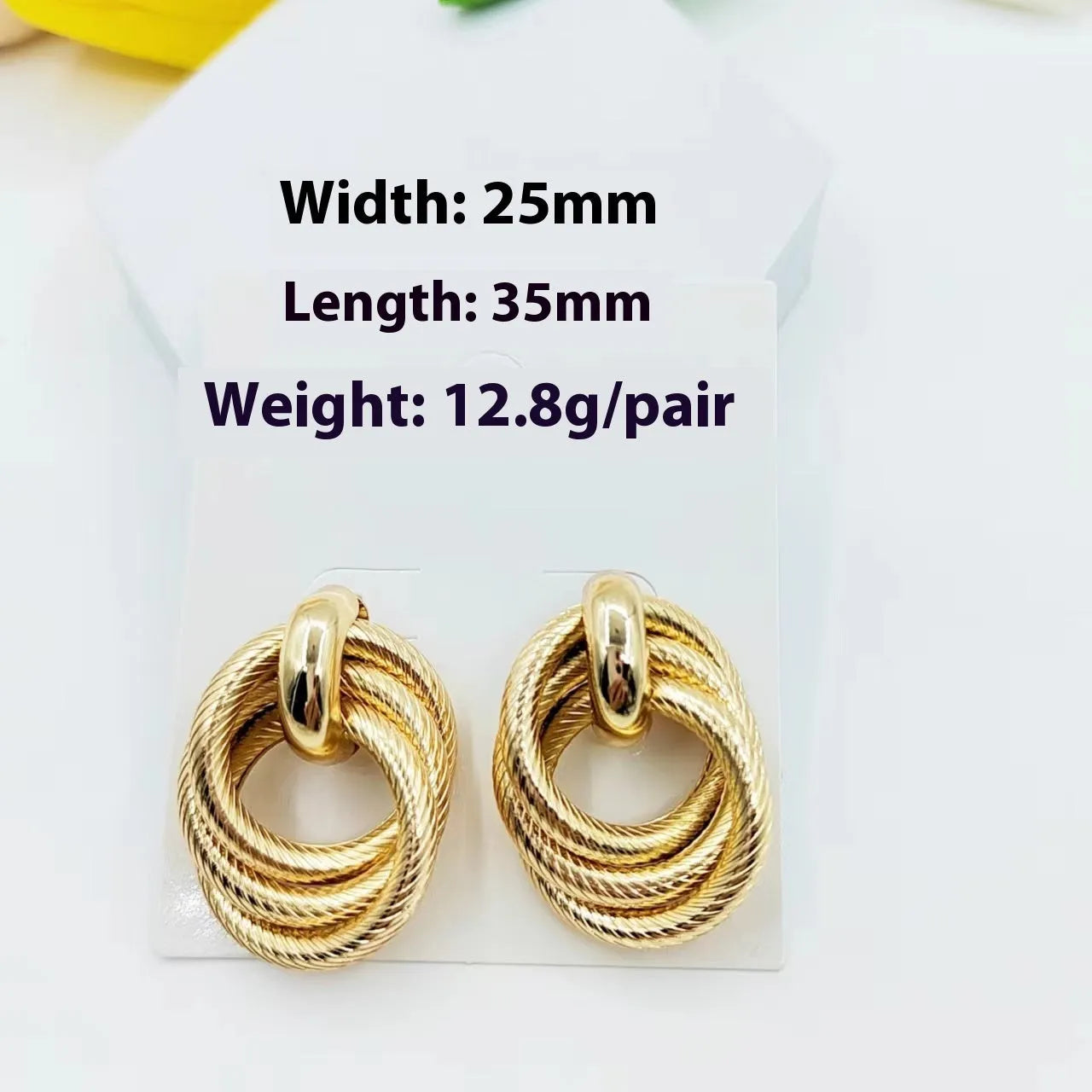Gold geometric ring embossed twisted stud earrings with exaggerated creative design on metal