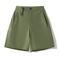 Men's solid colour quick-dry sports shorts with elastic sides for running and climbing.