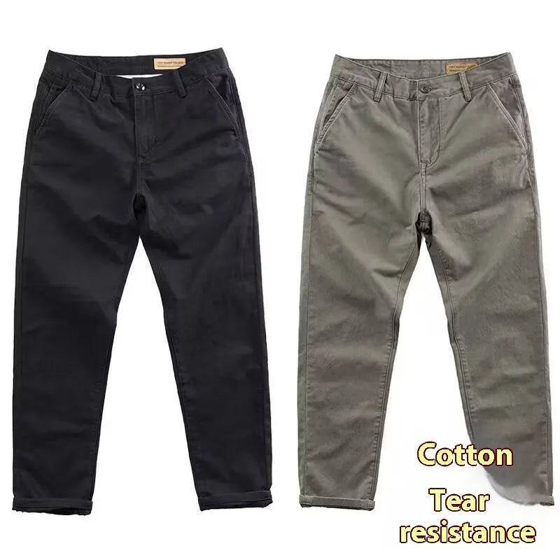Man wearing slim-fit light straight-leg trousers in a micro-elastic washed fabric