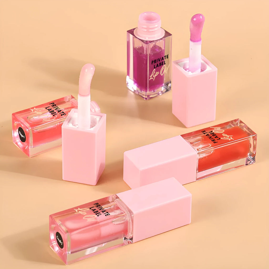 Women's transparent lip gloss set showing six 6ml tubes in fruity shades
