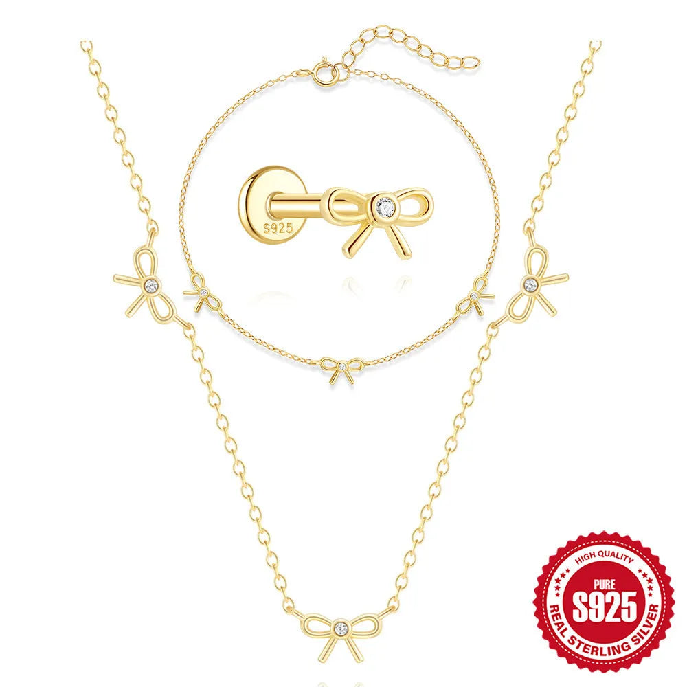 S925 sterling silver bow pendant ear bone stud bracelet necklace jewellery set with gold electroplated finish on O-shaped chain