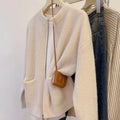 Beige viscose knit sweater coat for women, shown as an open-front cardigan with long sleeves.