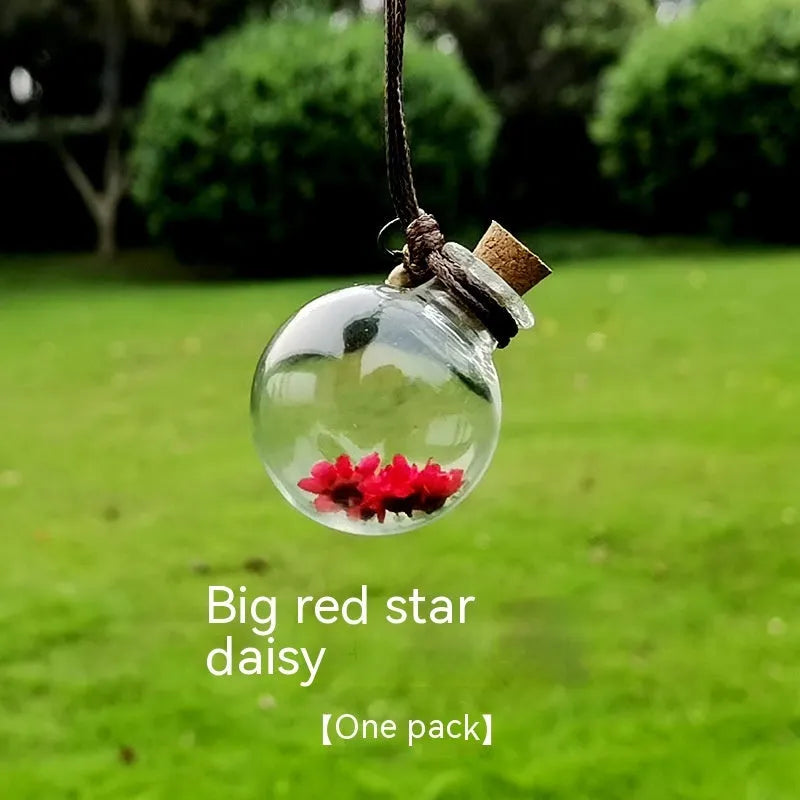Glass car perfume pendant with preserved flowers in selected colour and diameter