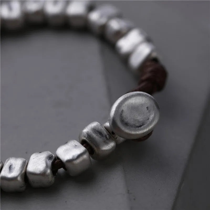 Handmade wooden bracelet with irregular silver square charm on elastic band