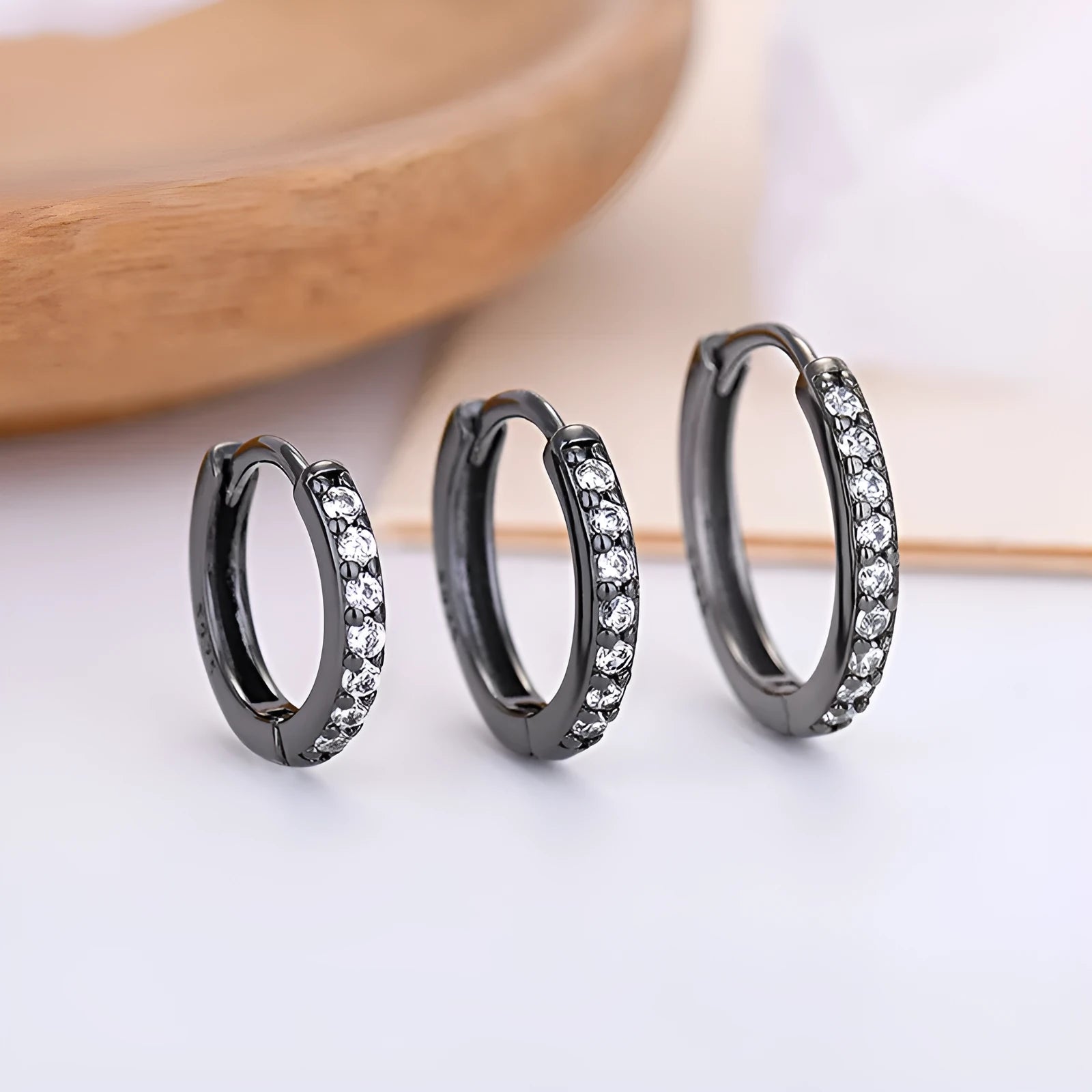 Gang Drill Zircon stud earrings in silver with geometric starry sky design, unisex style