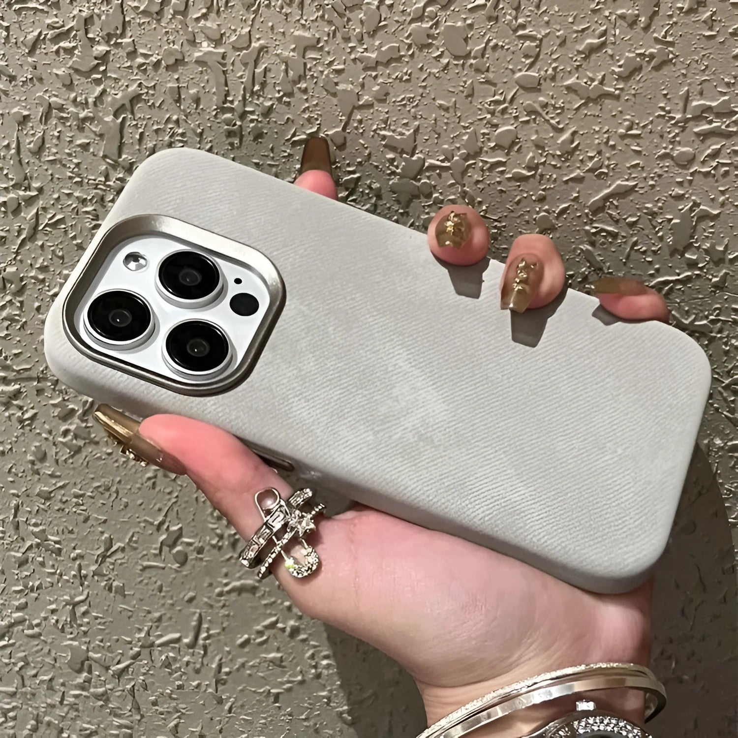 Magnetic leather drop-resistant flannel phone case in silver grey for iPhone.