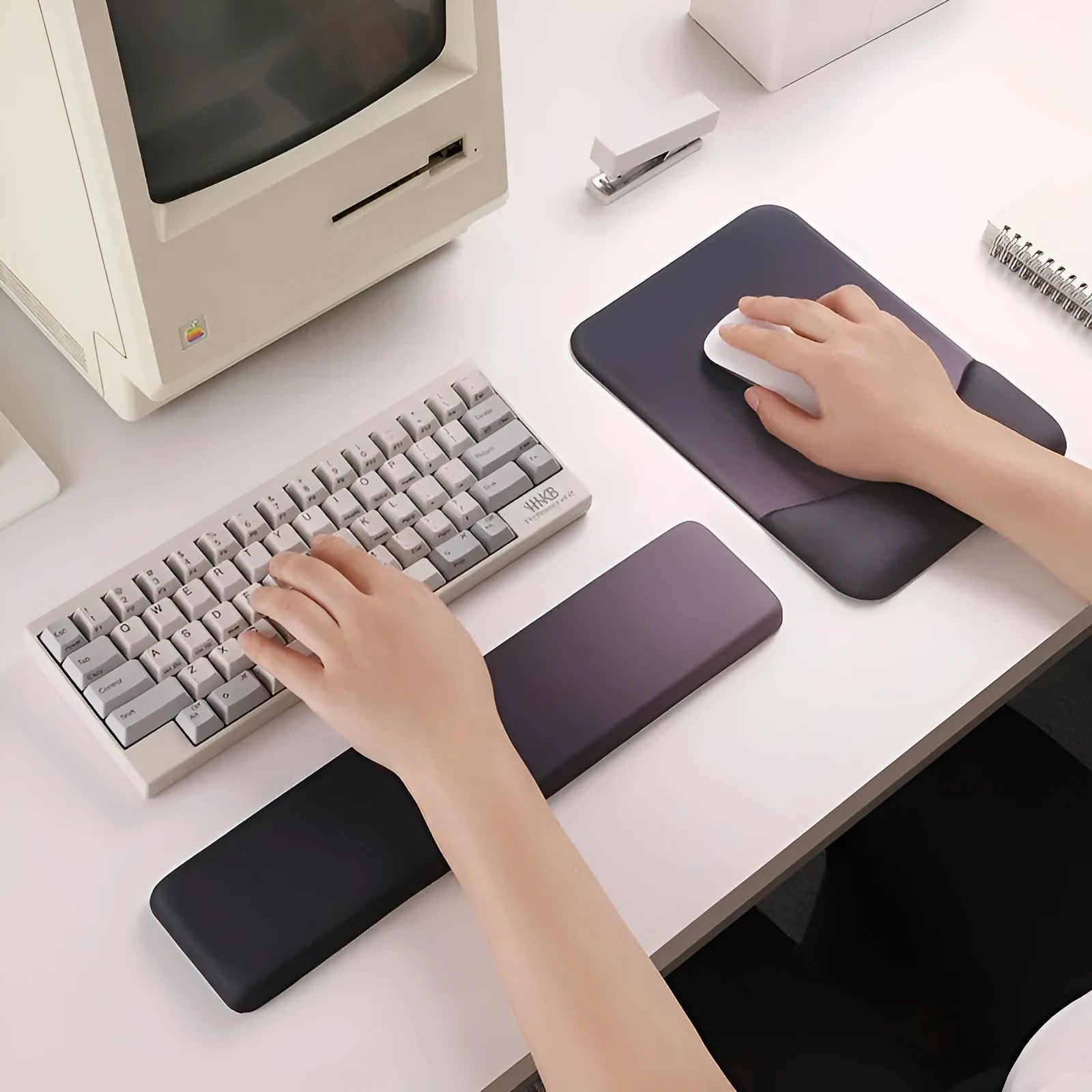 Square silica gel wrist rest mouse pad with cloth surface in colour options of black, blue, pink, or purple