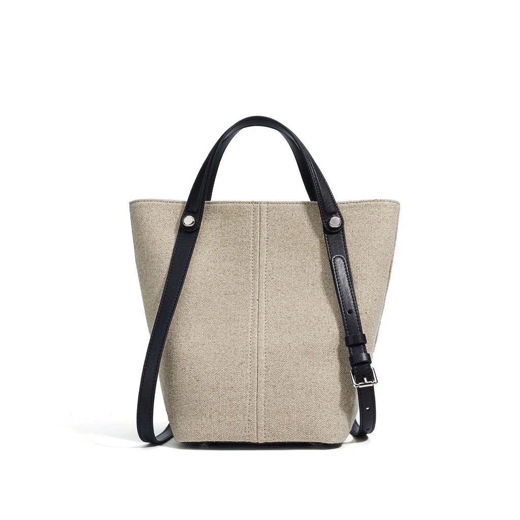 Genuine leather shoulder bag in Linen Black with contrast stitching and open pocket