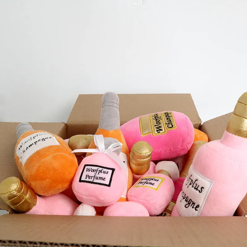 Plush wine bottle shaped dog toy with squeaker in multiple colour variations