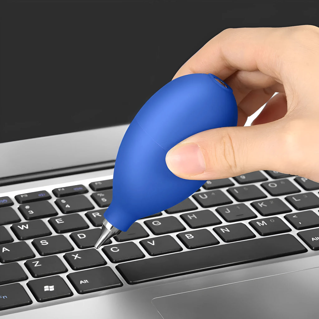 Blue handheld rubber dust removal blower ball for cleaning camera lenses and mobile phones.