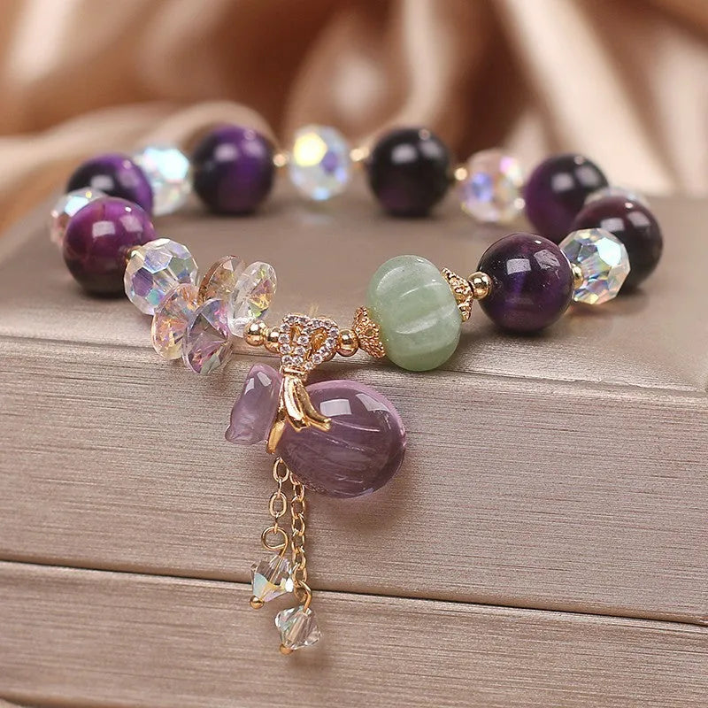 Purple Tigereye money bag pendant transport bracelet with crystal and rhinestone details