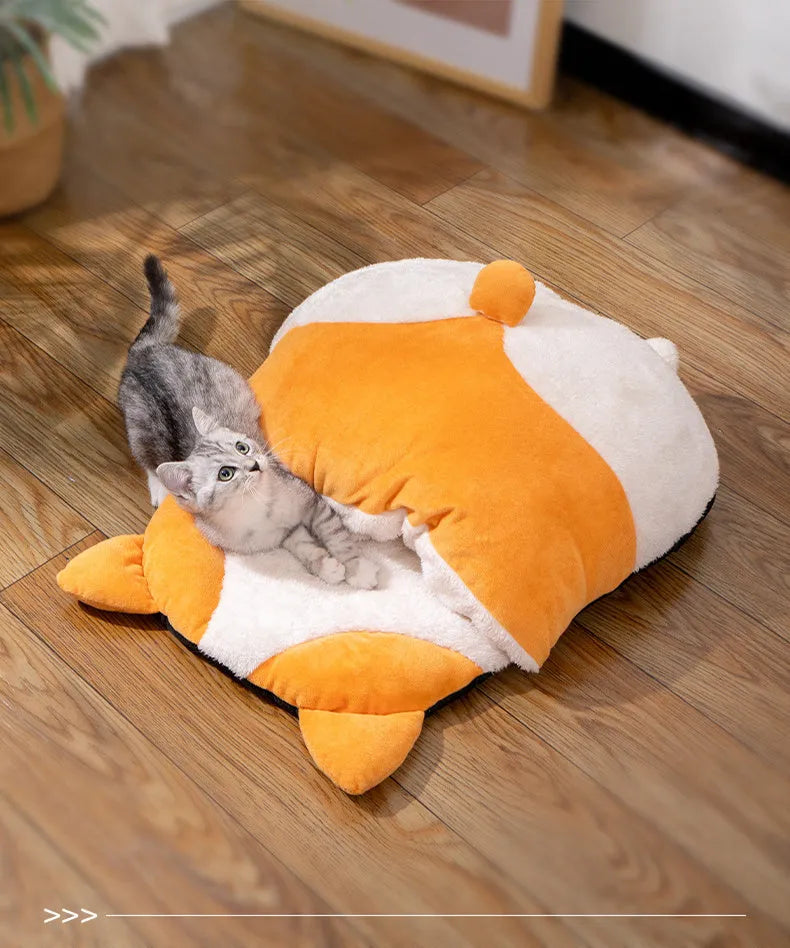 Orange semi-closed cat sleeping bag bed with integrated mat, 65cm long.