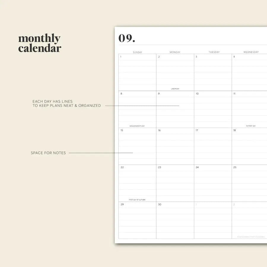 Cherry red A5 daily schedule coil notebook with spiral binding open on desk