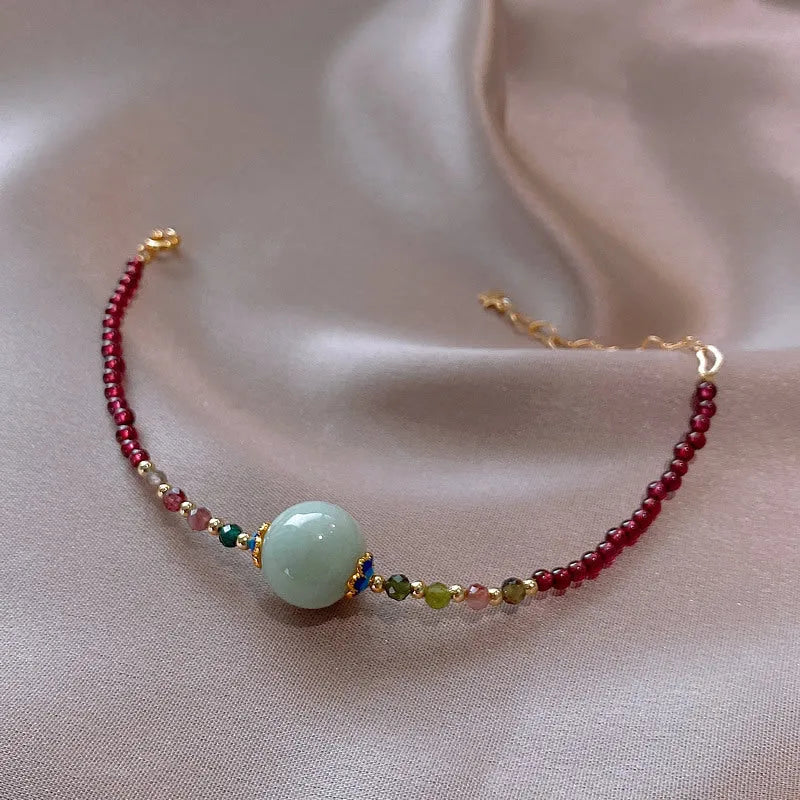 Garnet-coloured tourmaline drop bracelet in electroplated setting for women.