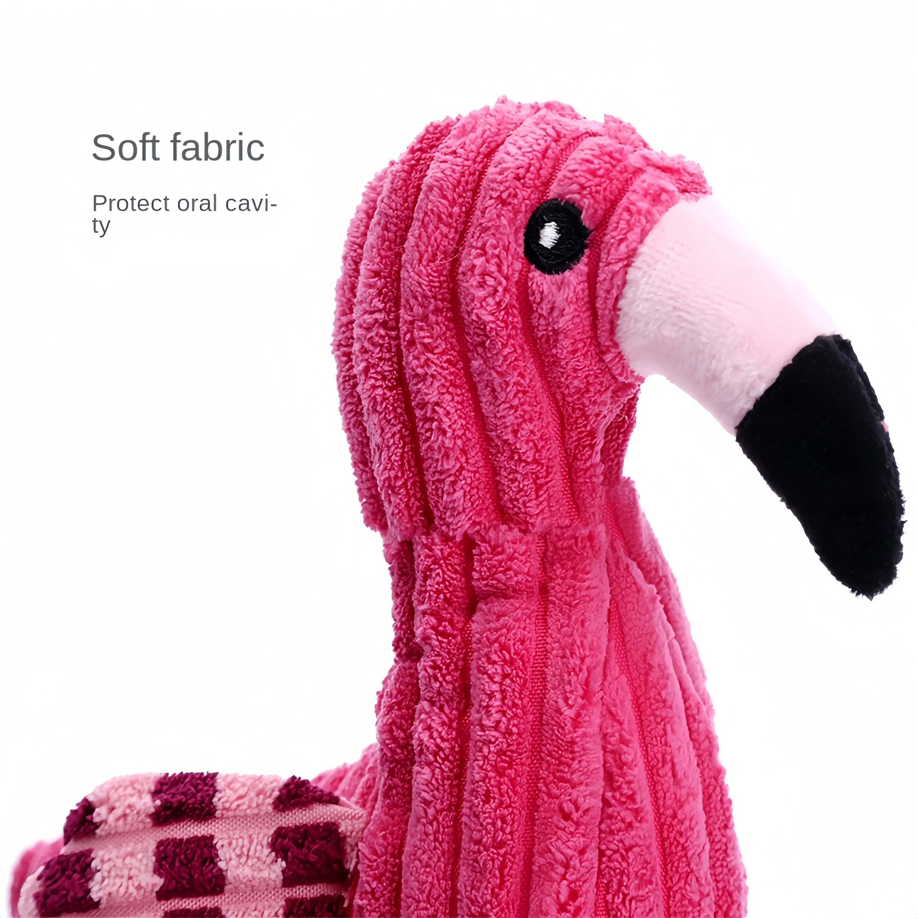 Pink animal-shaped corduroy plush dog squeaky toy for chewing play.