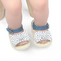 Black and white Velcro fastening toddler shoes for infants with low-cut design