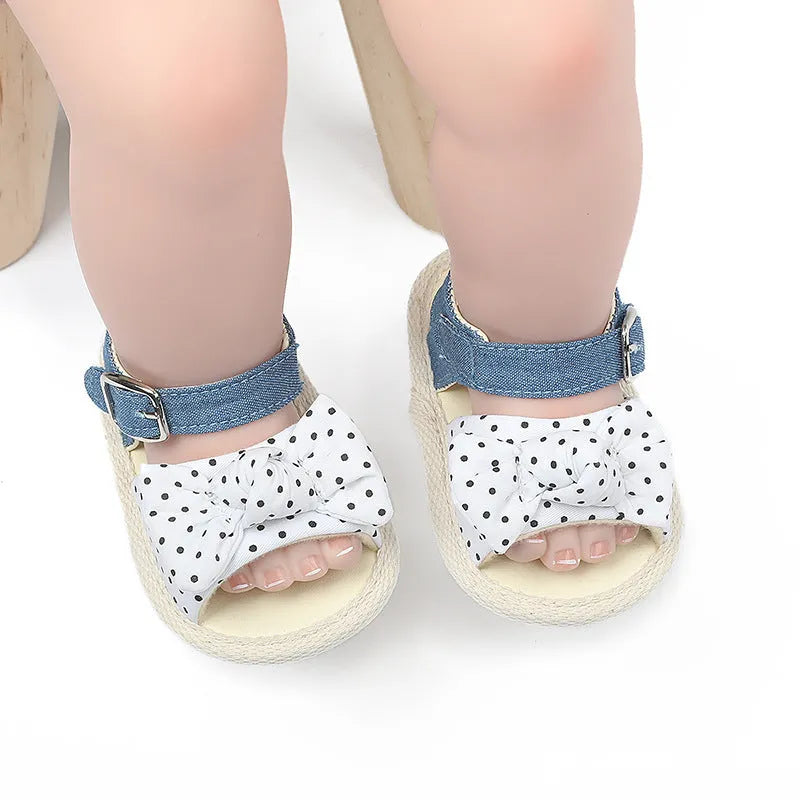 Black and white Velcro fastening toddler shoes for infants with low-cut design