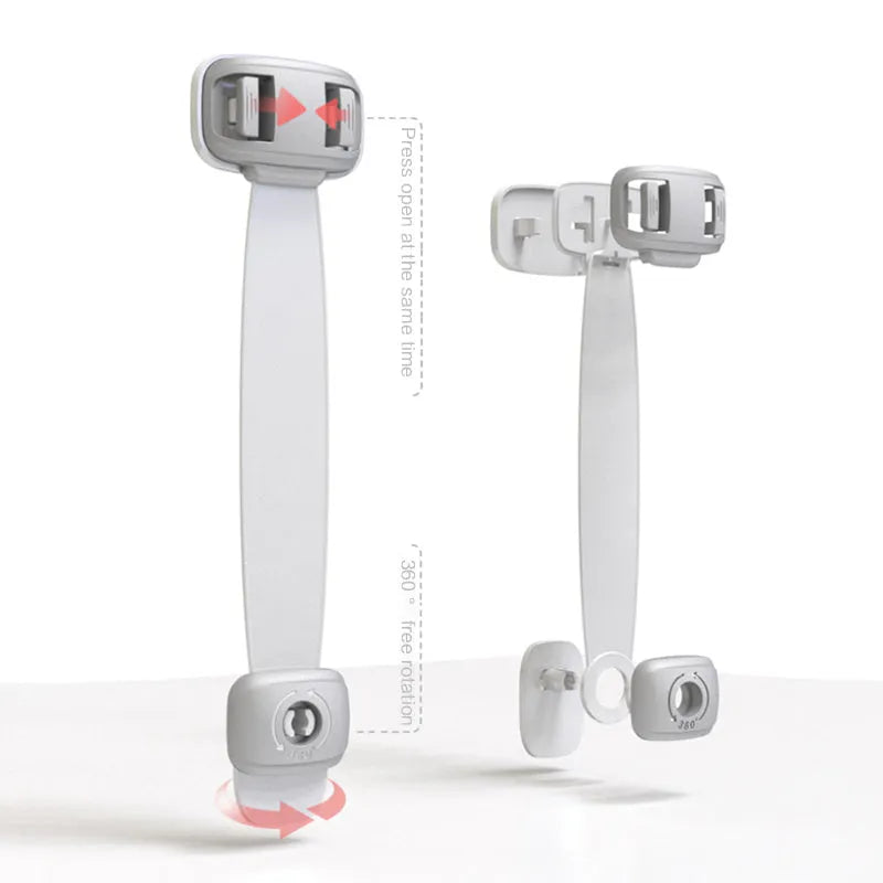 Grey and green adjustable strap child safety locks for cabinets and drawers with adhesive backing.