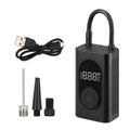 Compact black handheld wireless tyre inflator with digital display, attached air hose, and USB cable.