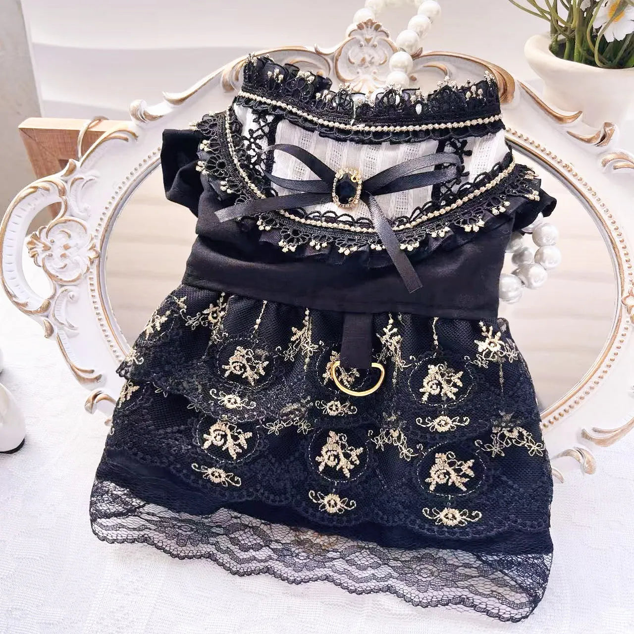 Golden gothic-style princess skirt for a small dog or cat on a mannequin.