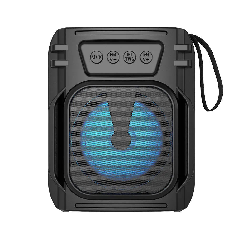 Portable Bluetooth speaker with compact design and USB charging cable