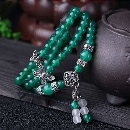 Green multi-layer agate bracelet with three strands of hand-made 6mm beads.
