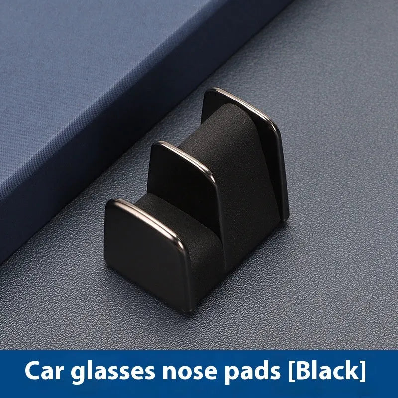 Zinc alloy car dashboard sunglasses holder with leather strap in black, green, grey, or red.