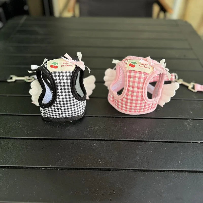 Pink cotton chest-back dog harness with handle for small dogs on a white background.
