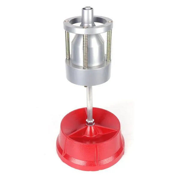 Portable hub balancer with aluminium head for car wheels showing bull's eye level and enamel-finished base