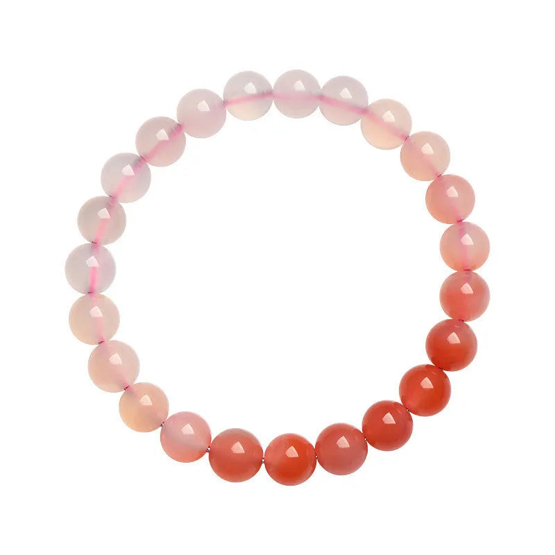 Yanyuan Agate bracelet with gradient salt source colour on wrist, showing geometry-shaped beads.