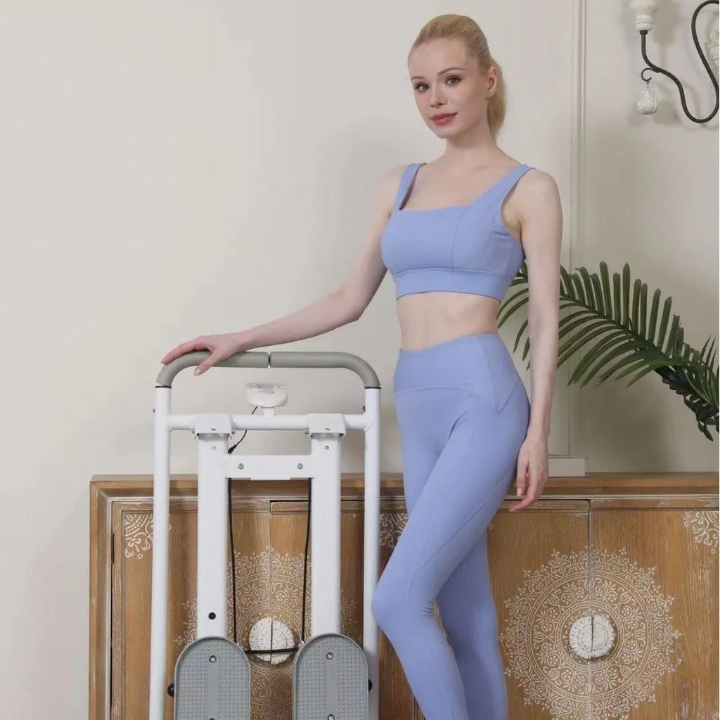 Starlight White foldable treadmill integrated with a climbing frame for home gym use.