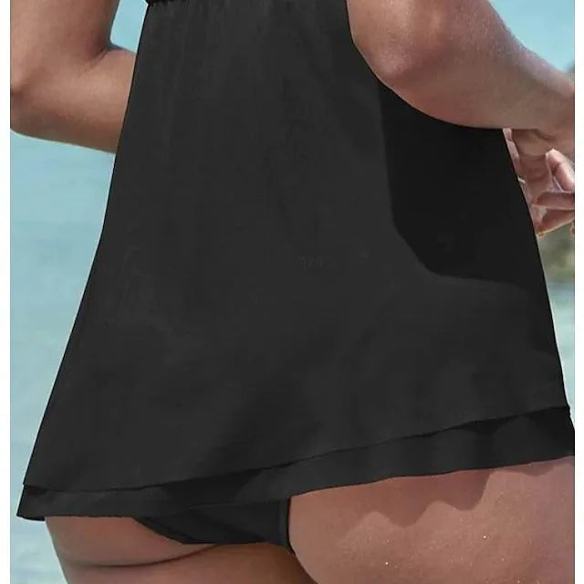 Women's strapless one-piece swimsuit in solid colour polyester fabric on mannequin
