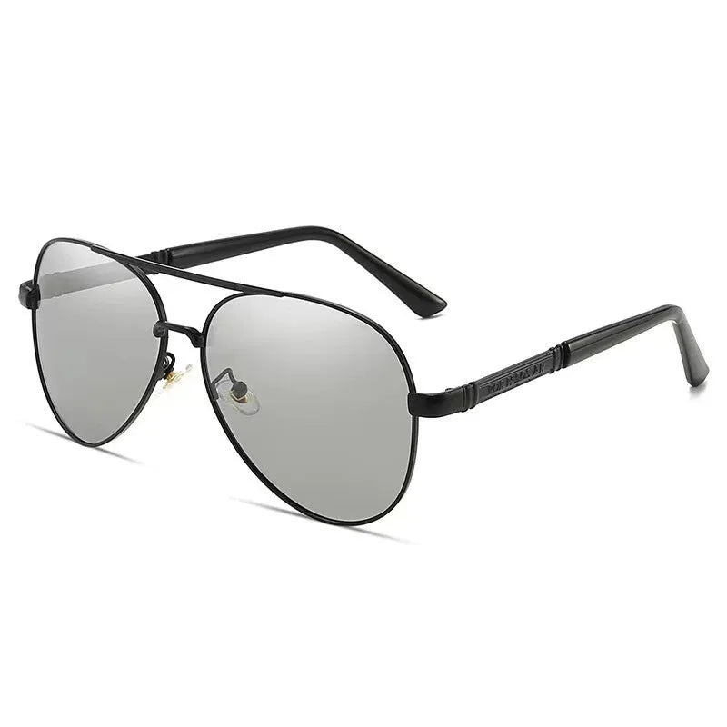 Men's polarised sunglasses with metal frame and interchangeable colour lenses for sun protection.
