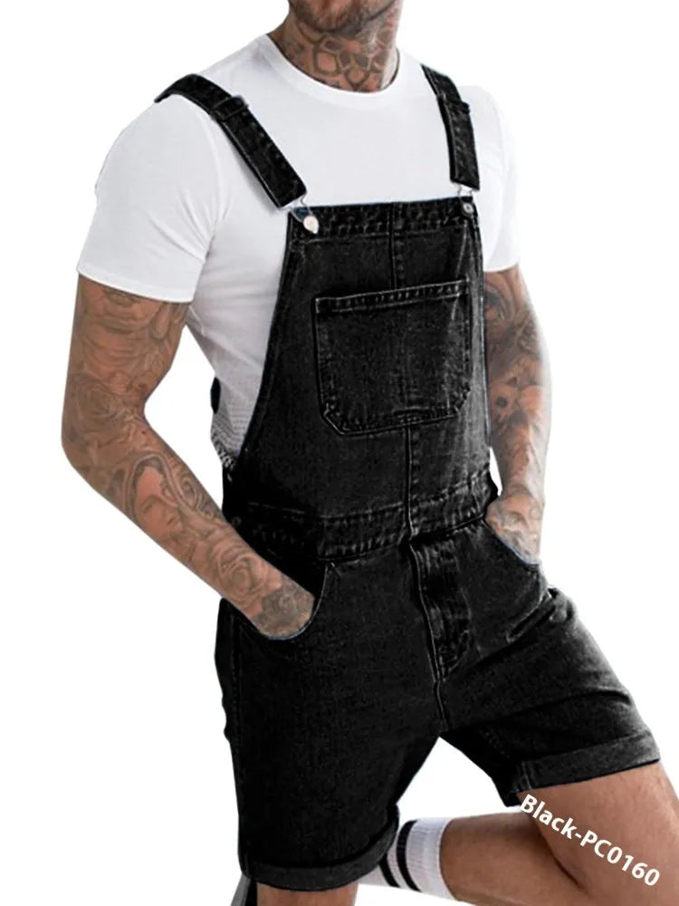 A pair of black denim suspender pants with a mid waist, zipper fly, and straight leg shorts cut on a mannequin.