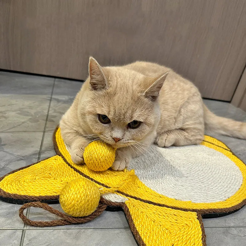 Yellow corgi-butt design sisal cat scratching pad with anti-slip base on a wooden floor.