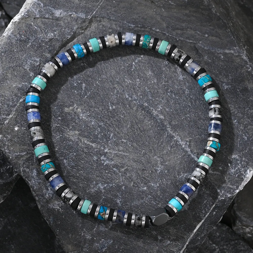 Hand-woven bohemian bracelet with cylindrical geometric semi-precious stones