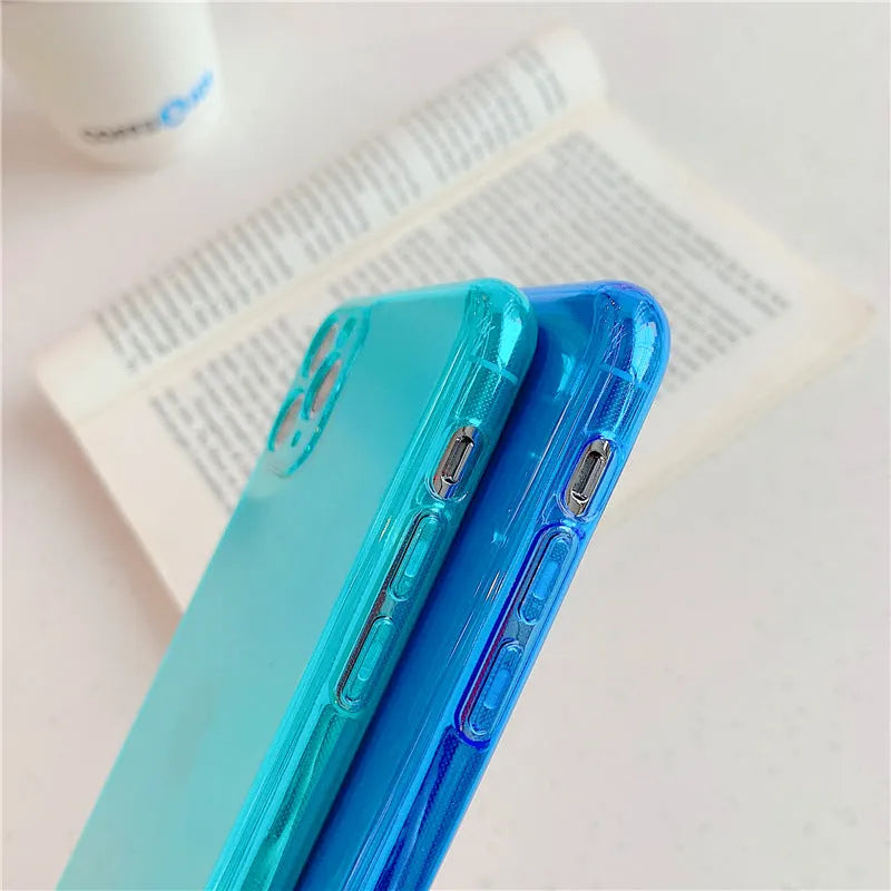 Transparent fluorescent TPU phone case in orange for iPhone 15 Pro Max showing slim back cover design
